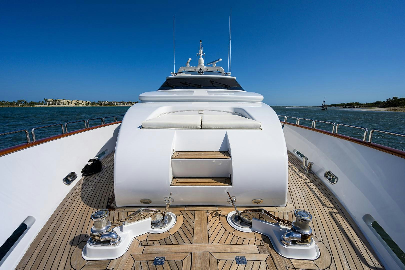 a large white boat on a deck aboard MY DESTINY Yacht for Sale