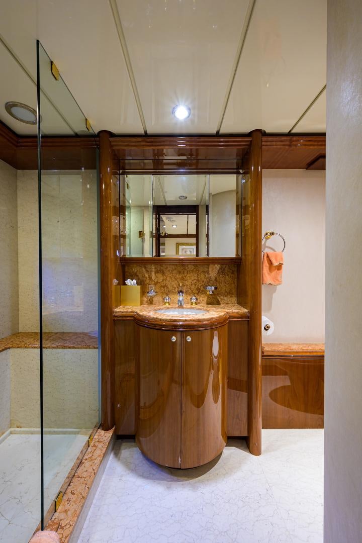 a bathroom with a sink and a mirror aboard MY DESTINY Yacht for Sale