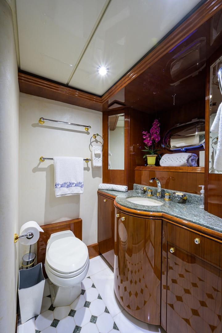 a bathroom with a toilet and sink aboard MY DESTINY Yacht for Sale