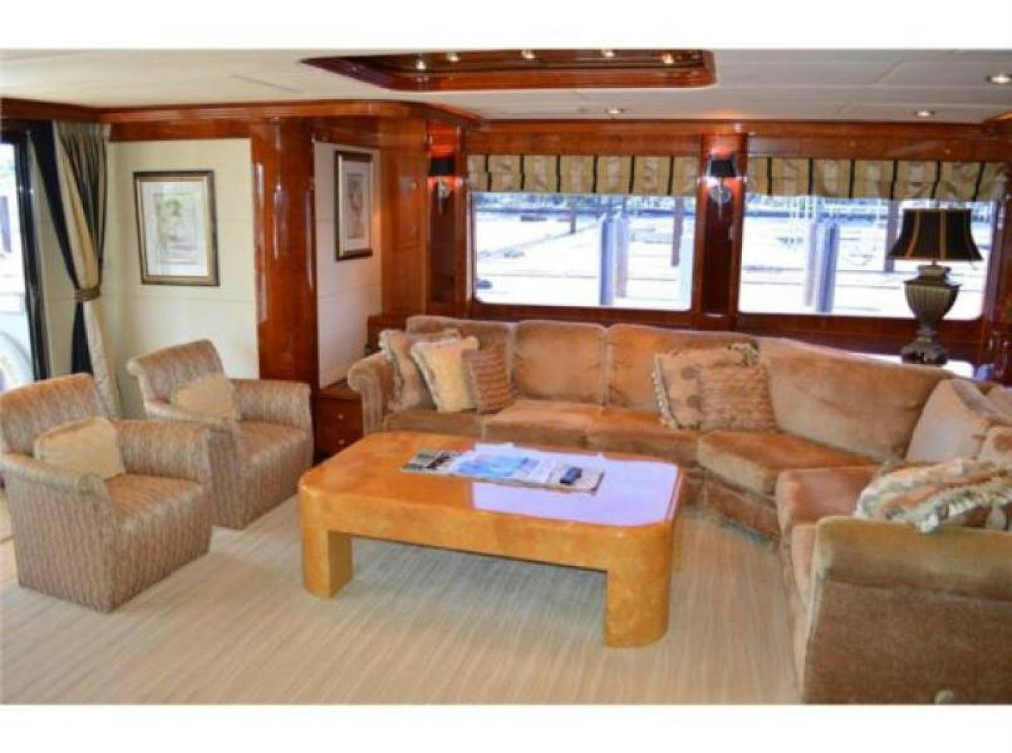 a living room with a couch and a coffee table aboard MY DESTINY Yacht for Sale