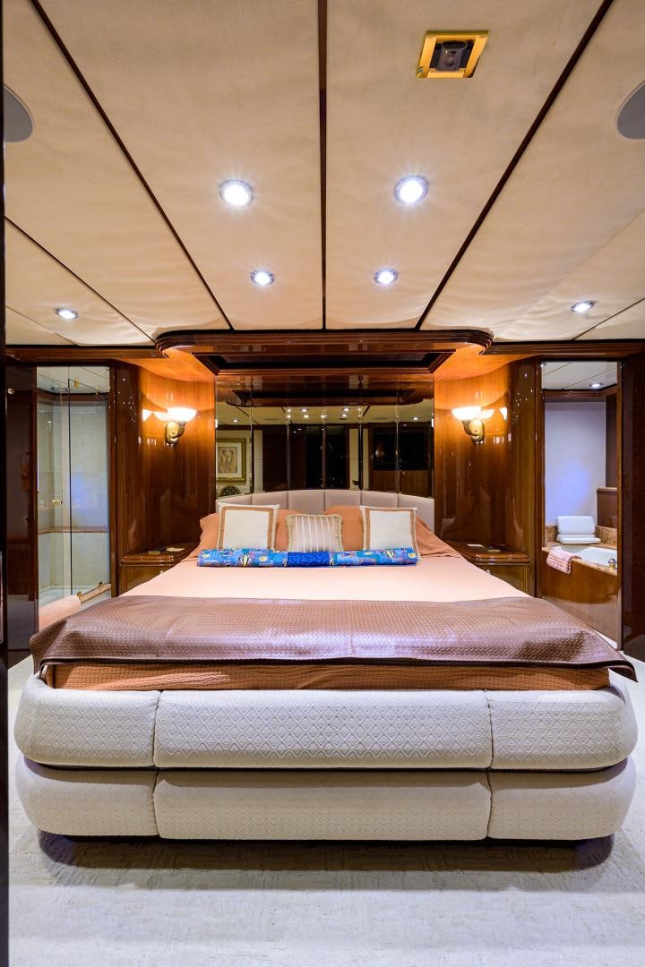 a large bed in a hotel room aboard MY DESTINY Yacht for Sale
