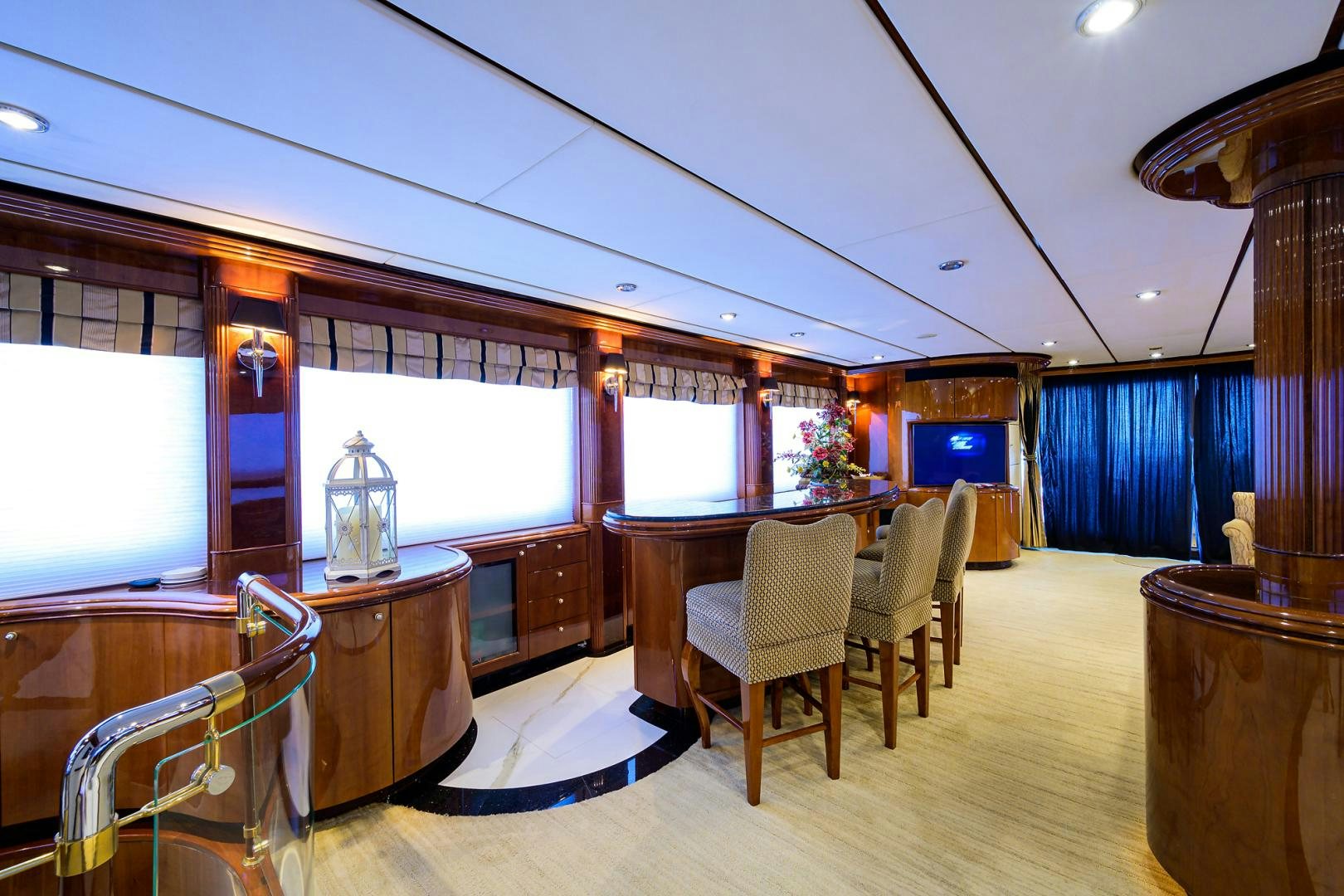 a large room with a table and chairs aboard MY DESTINY Yacht for Sale