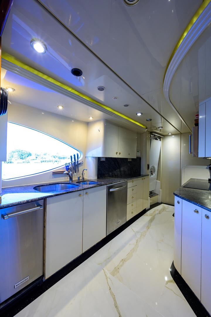 a kitchen with a large window aboard MY DESTINY Yacht for Sale