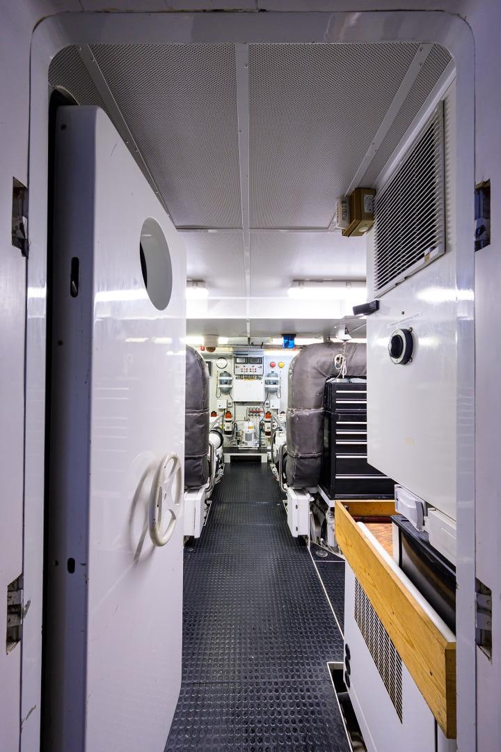 a hallway with a row of white machines aboard MY DESTINY Yacht for Sale