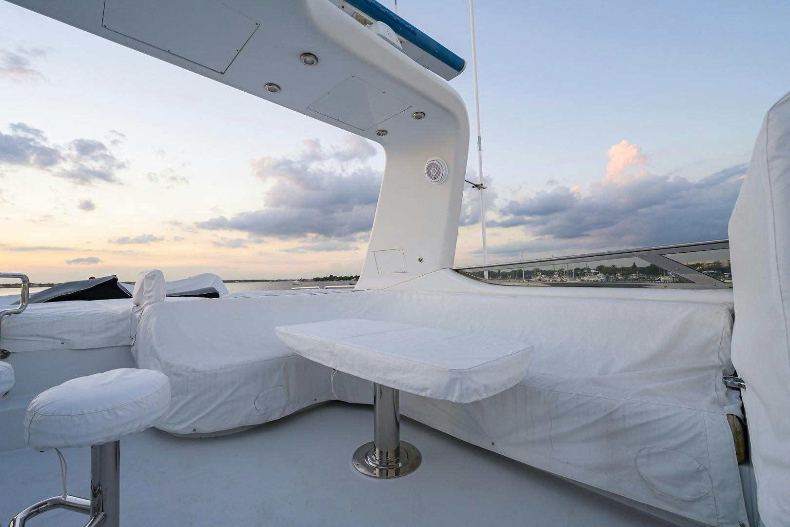 a white boat on a deck aboard MY DESTINY Yacht for Sale
