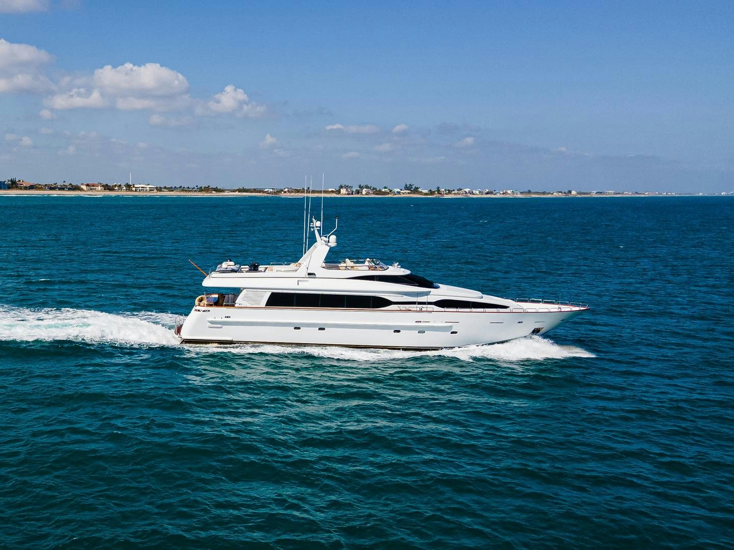 a white boat in the water aboard MY DESTINY Yacht for Sale