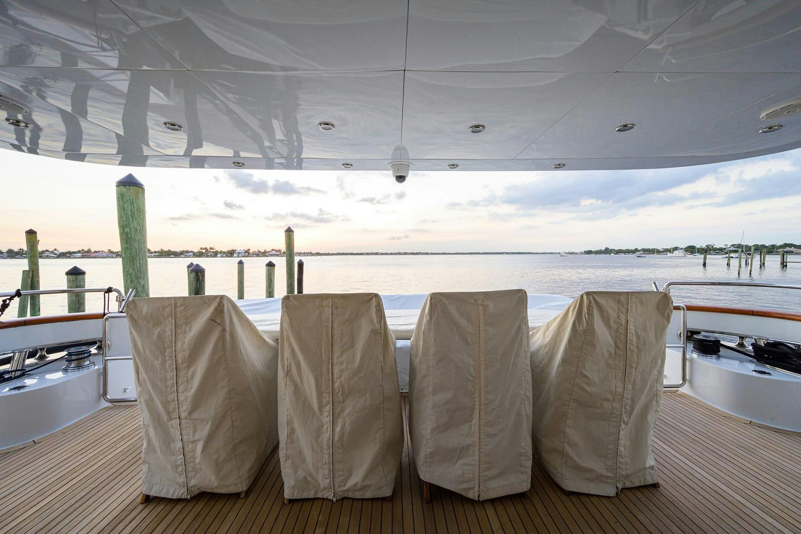 a group of white towels on a bar over a body of water aboard MY DESTINY Yacht for Sale