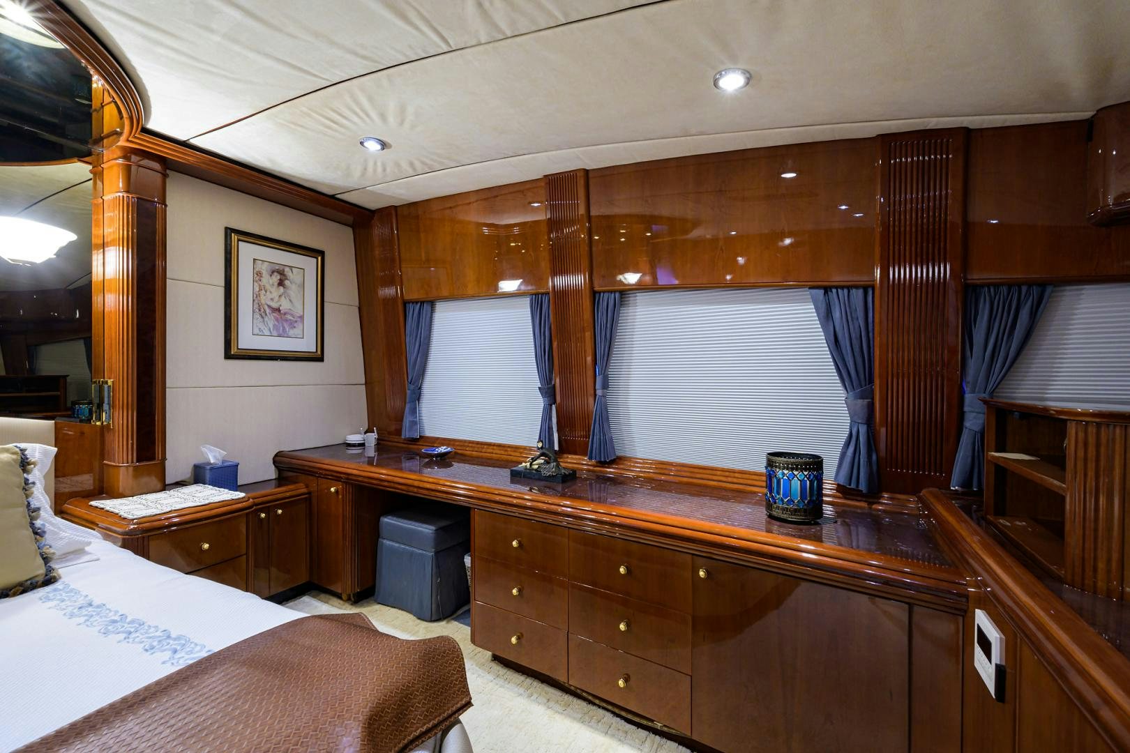 a bedroom with a desk and a bed aboard MY DESTINY Yacht for Sale