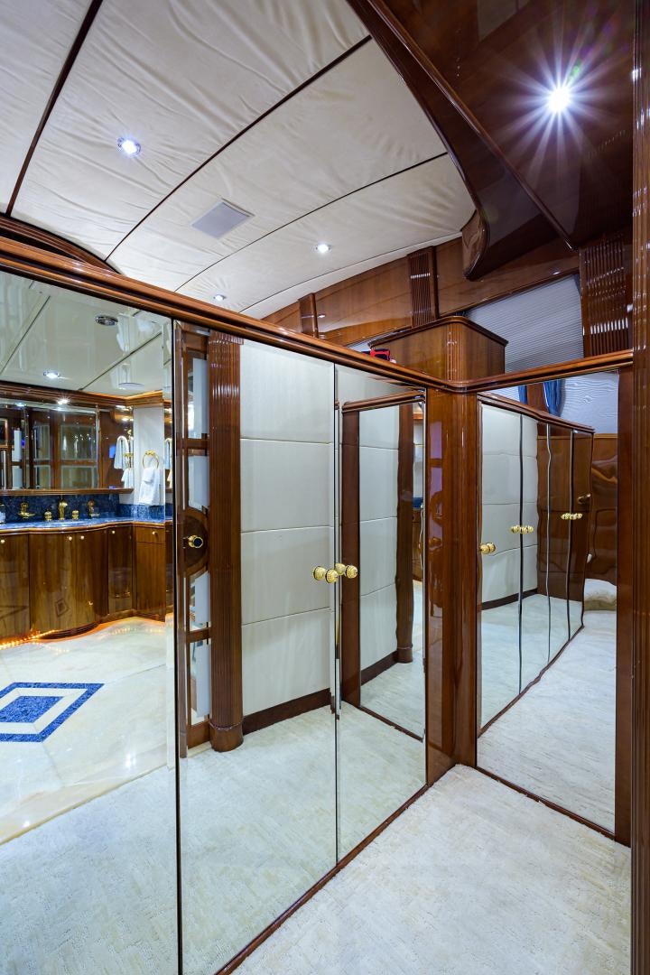 a large room with glass doors aboard MY DESTINY Yacht for Sale
