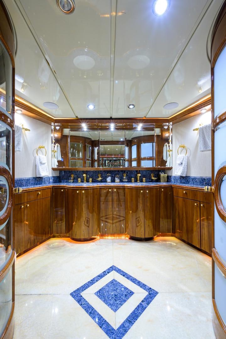 a bathroom with a large mirror aboard MY DESTINY Yacht for Sale