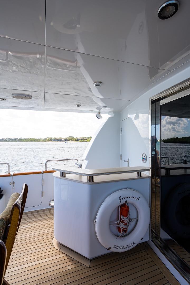 a white washing machine on a boat aboard MY DESTINY Yacht for Sale