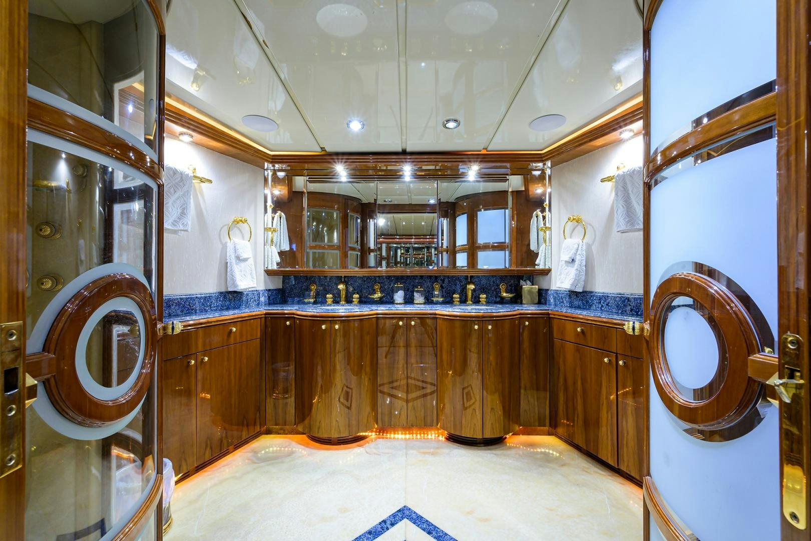 a large room with a large mirror aboard MY DESTINY Yacht for Sale