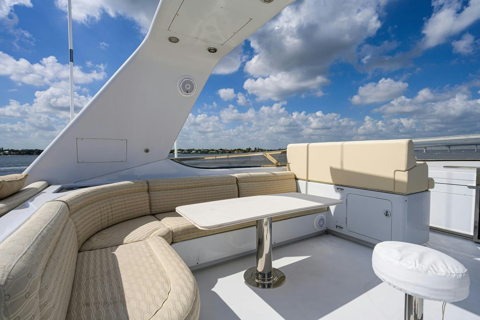 a white boat on a deck aboard MY DESTINY Yacht for Sale