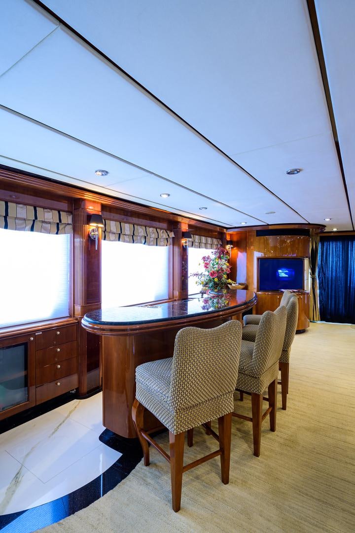 a dining table in a room aboard MY DESTINY Yacht for Sale