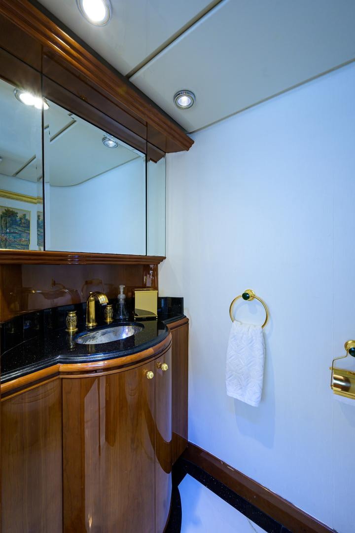 a bathroom with a sink and a mirror aboard MY DESTINY Yacht for Sale