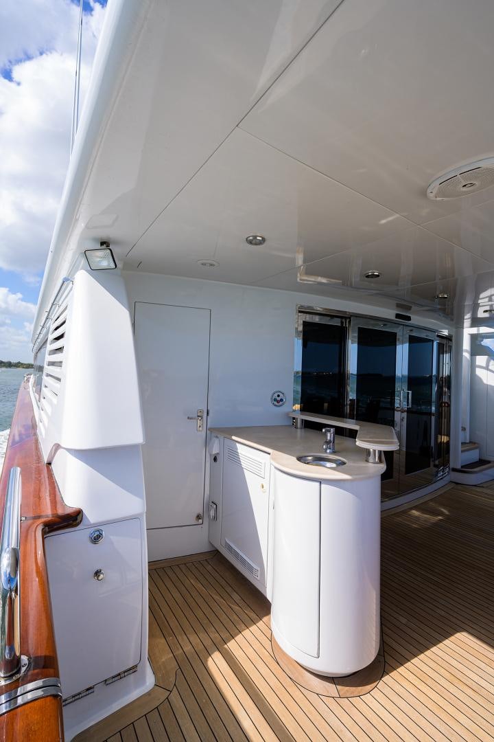 a kitchen with a large window aboard MY DESTINY Yacht for Sale