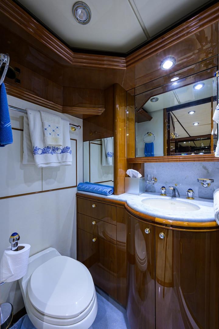 a bathroom with a sink and a mirror aboard MY DESTINY Yacht for Sale