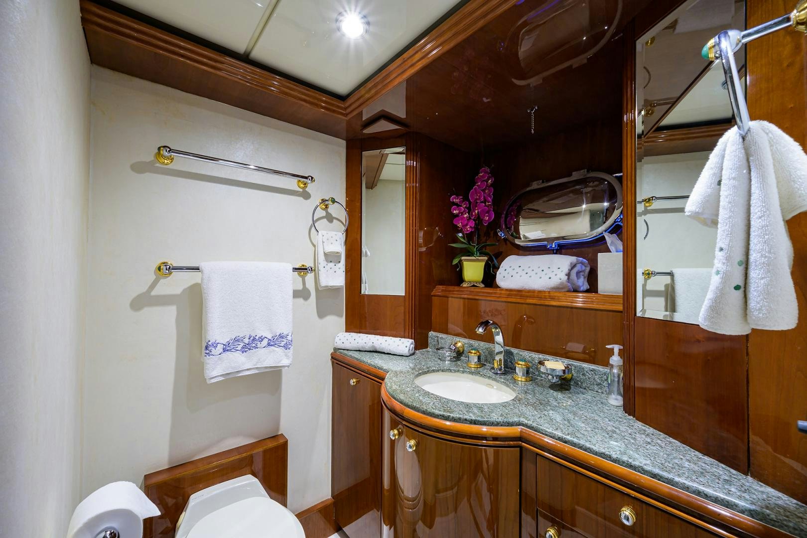a bathroom with a sink and a mirror aboard MY DESTINY Yacht for Sale