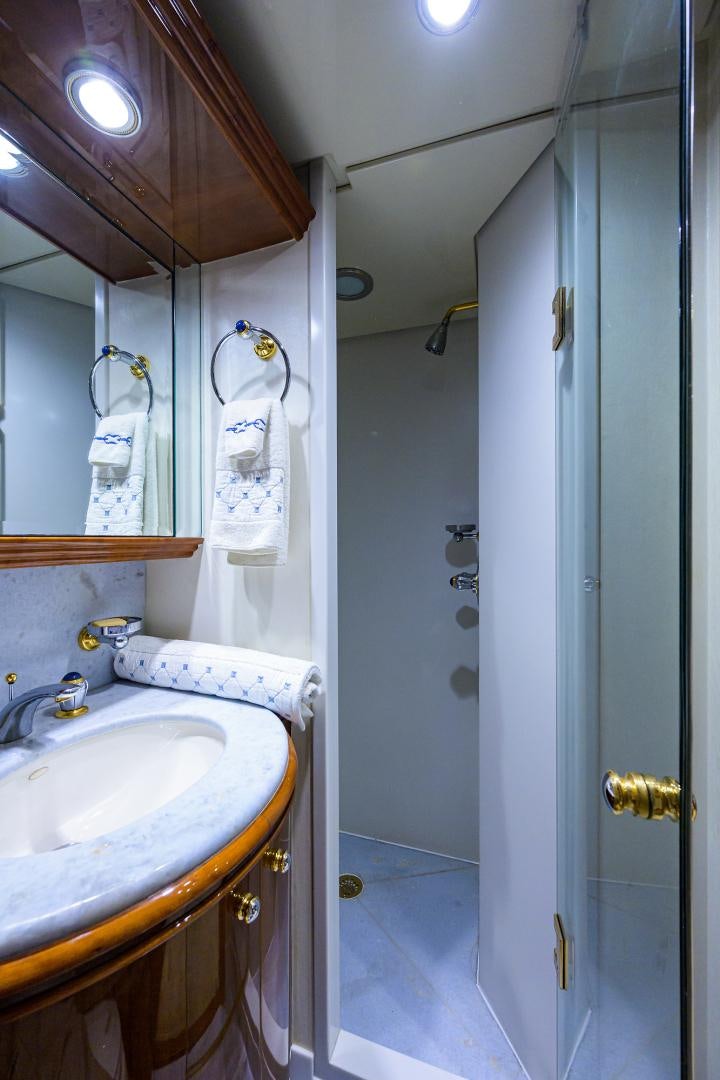 a bathroom with a sink and a shower aboard MY DESTINY Yacht for Sale