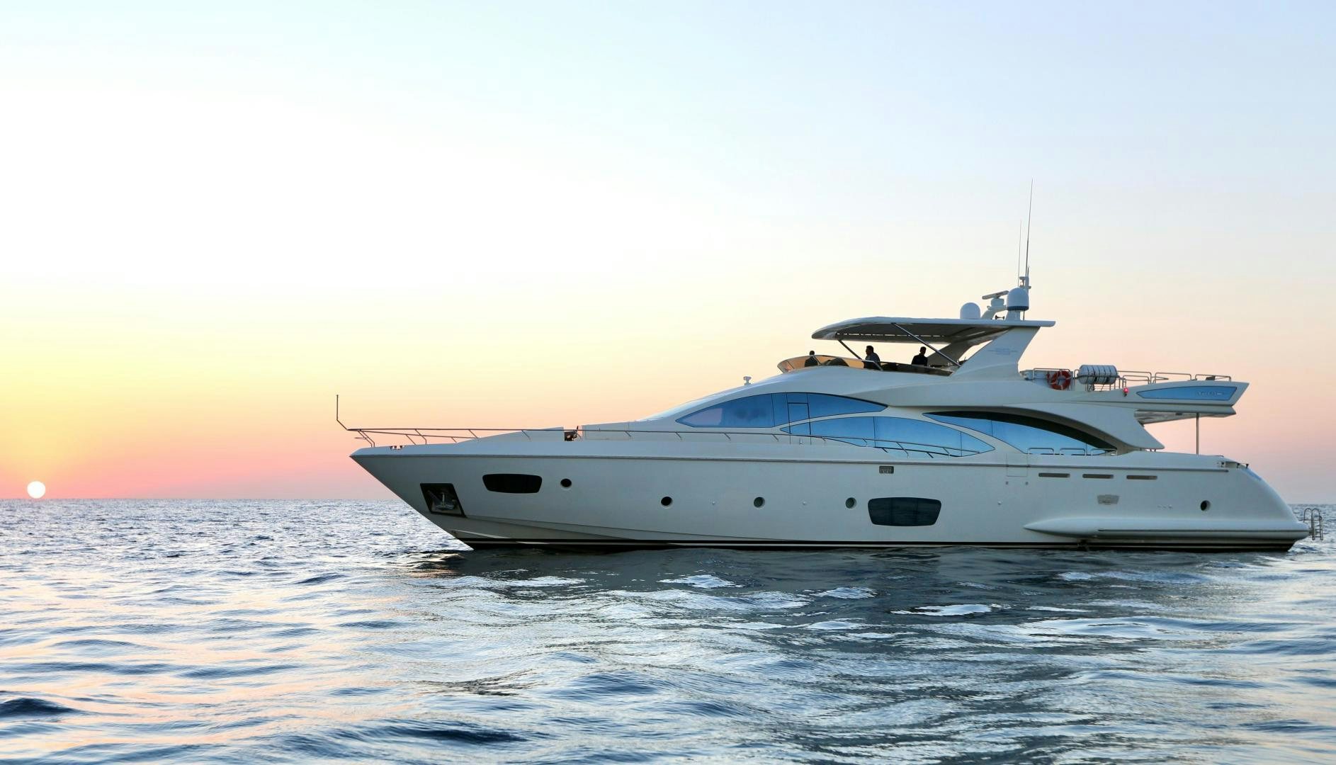 a white yacht in the water aboard ANDREIKA Yacht for Sale