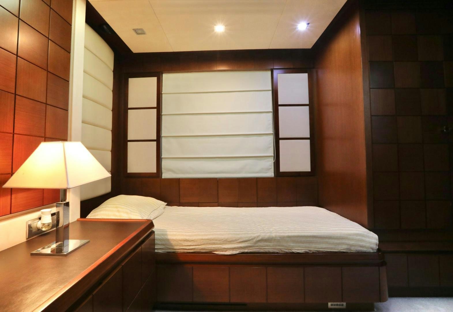 a bed in a room aboard ANDREIKA Yacht for Sale