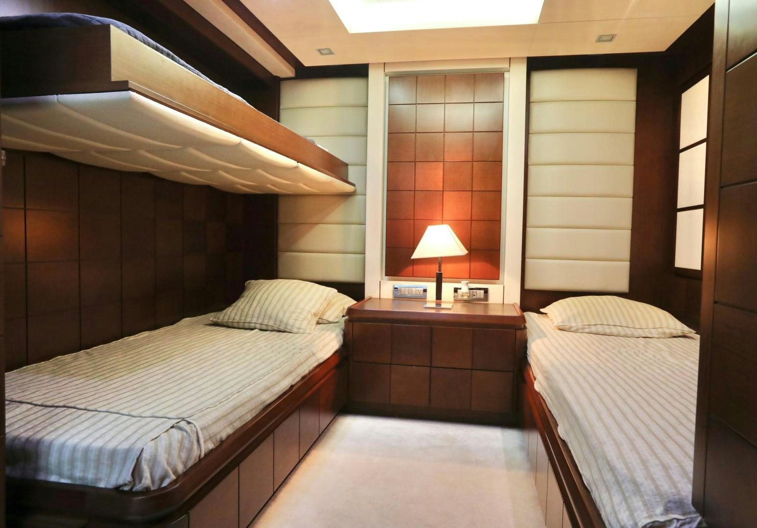 a couple of beds in a room aboard ANDREIKA Yacht for Sale