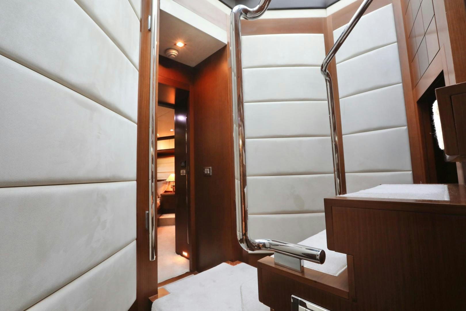 a staircase with white walls aboard ANDREIKA Yacht for Sale