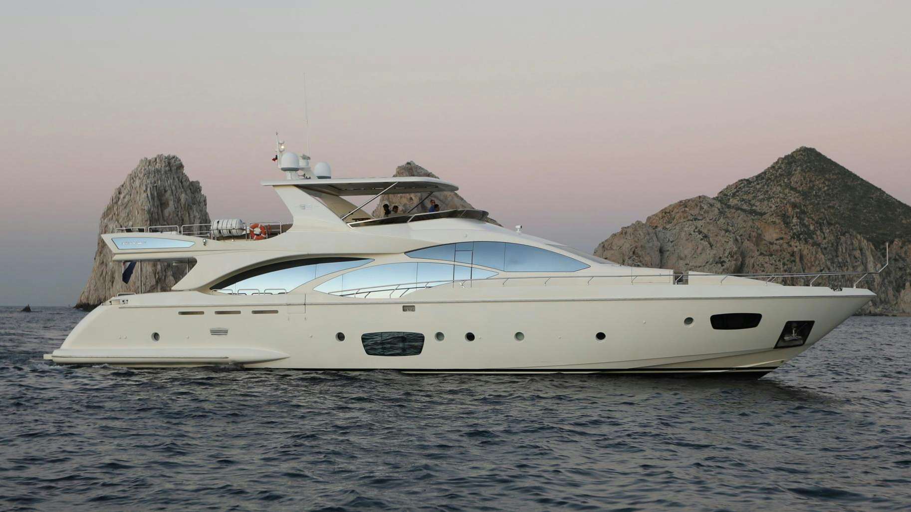 a white yacht on the water aboard ANDREIKA Yacht for Sale