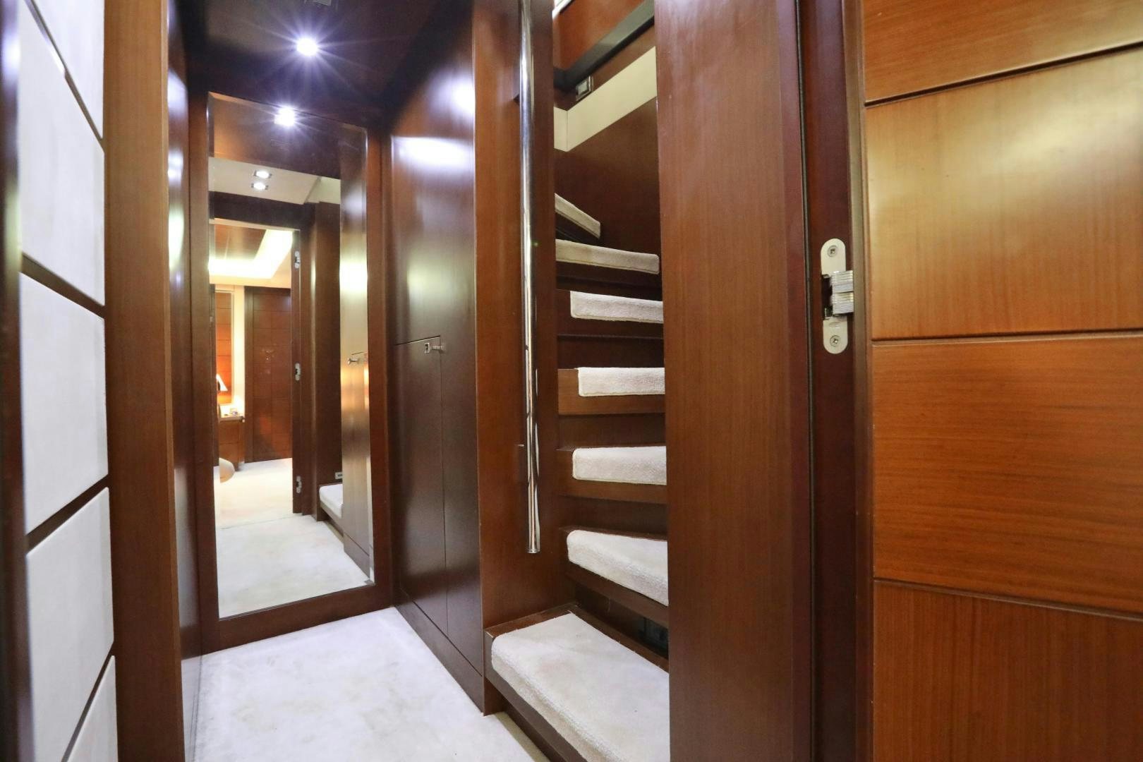 a hallway with wooden doors aboard ANDREIKA Yacht for Sale
