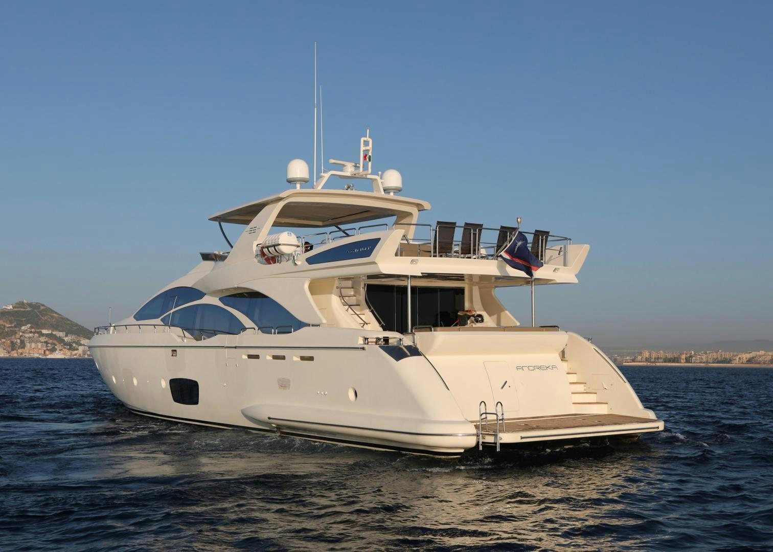 a white yacht on the water aboard ANDREIKA Yacht for Sale