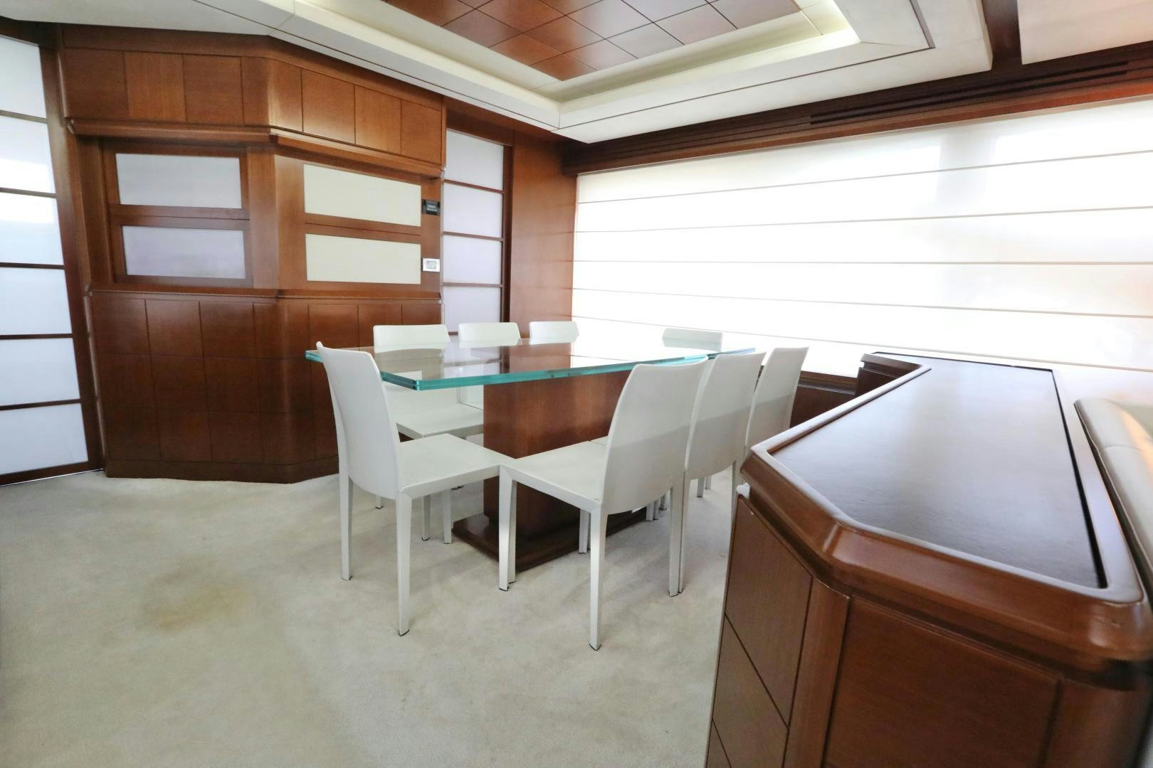 a room with a table and chairs aboard ANDREIKA Yacht for Sale