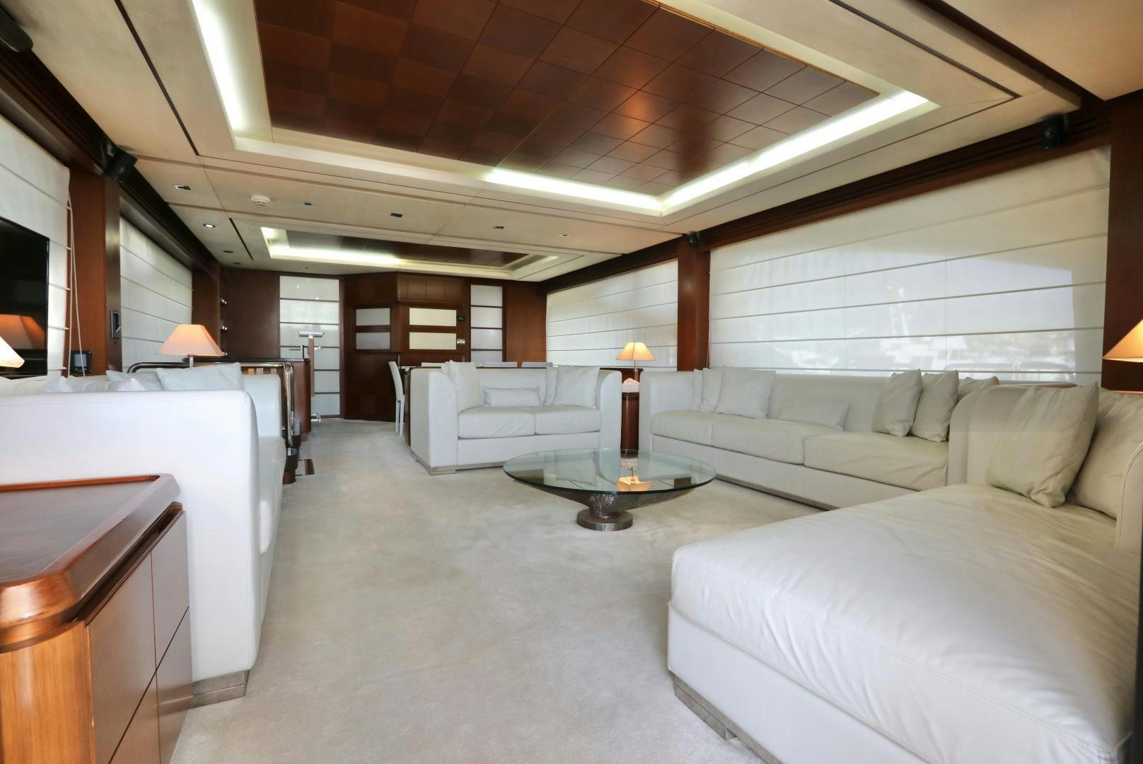 a living room with a couch and a table aboard ANDREIKA Yacht for Sale