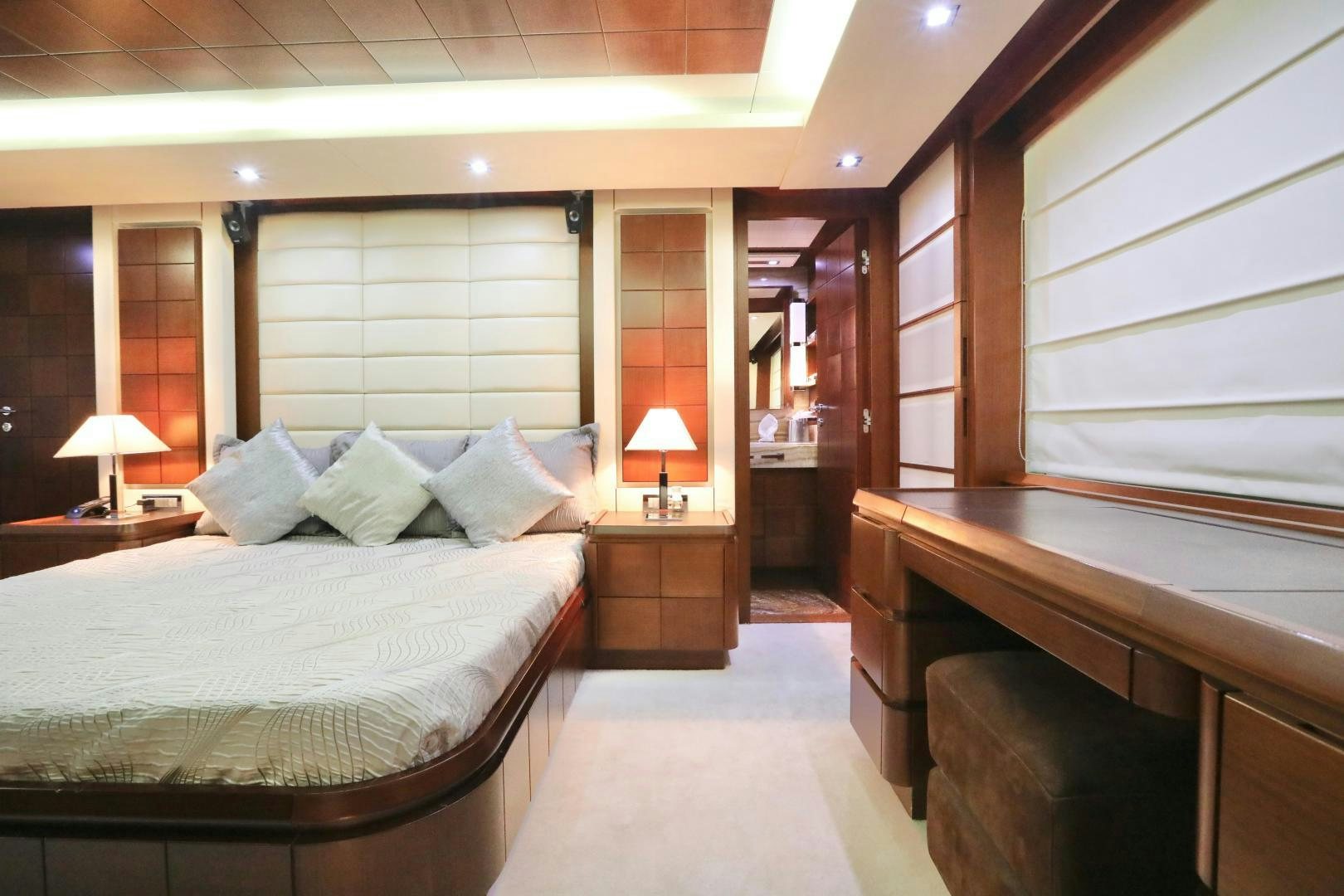 a room with a bed and a desk aboard ANDREIKA Yacht for Sale