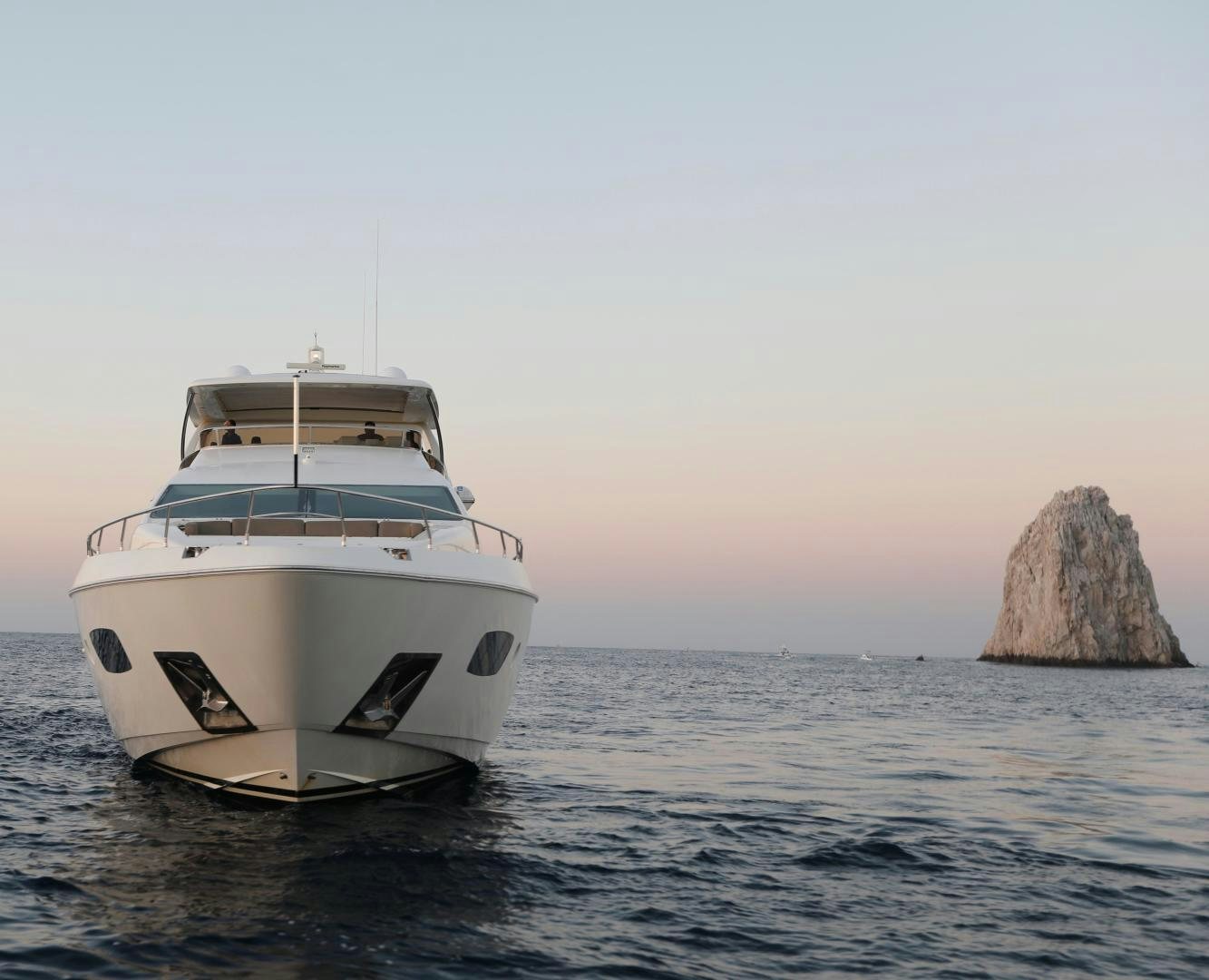 a couple of white yachts in the water aboard ANDREIKA Yacht for Sale