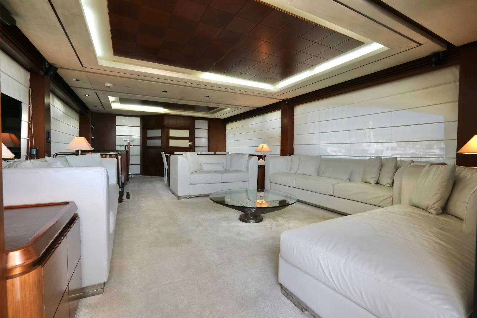 a living room with a couch and a table aboard ANDREIKA Yacht for Sale