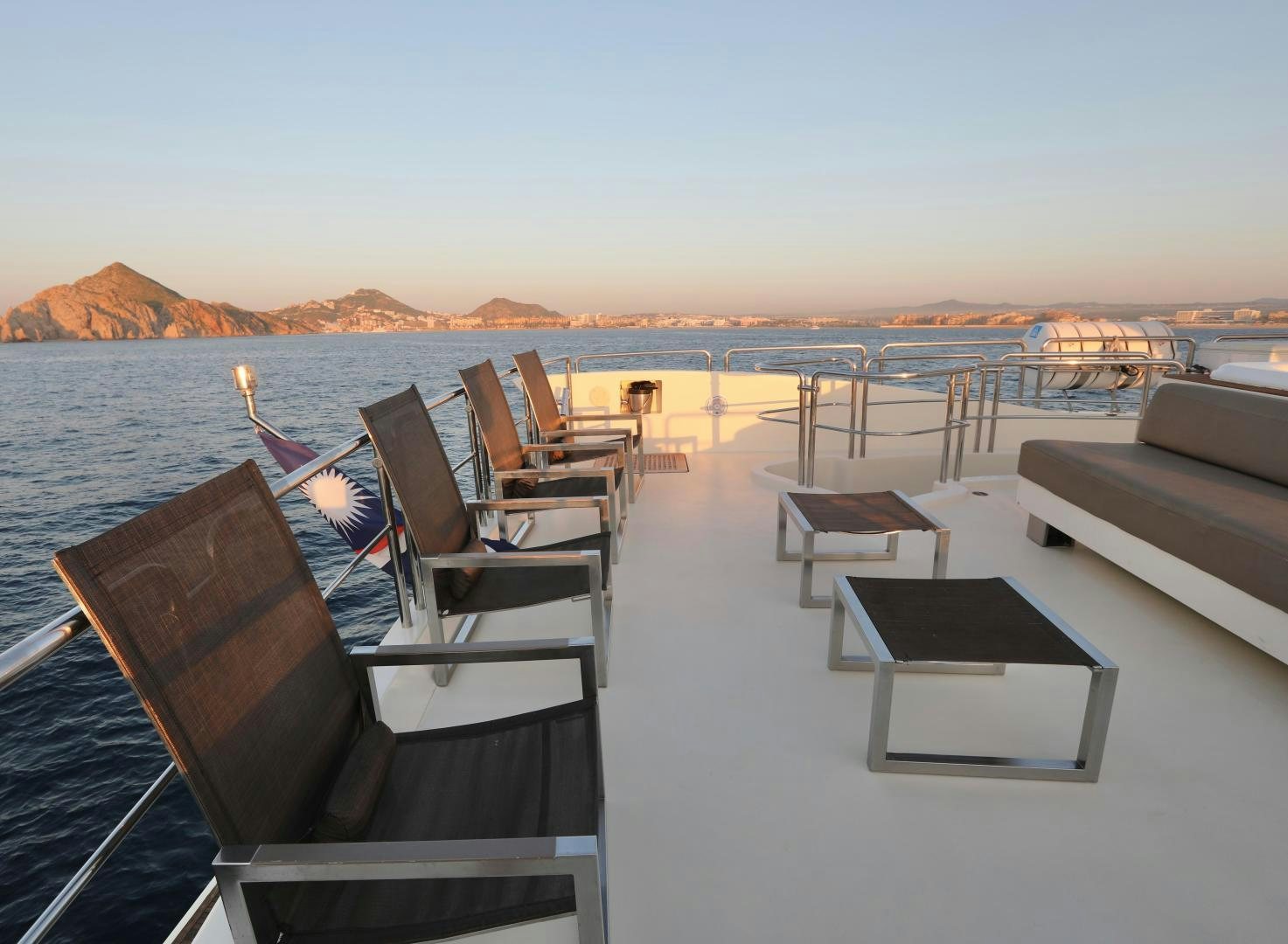 chairs and tables on a beach aboard ANDREIKA Yacht for Sale