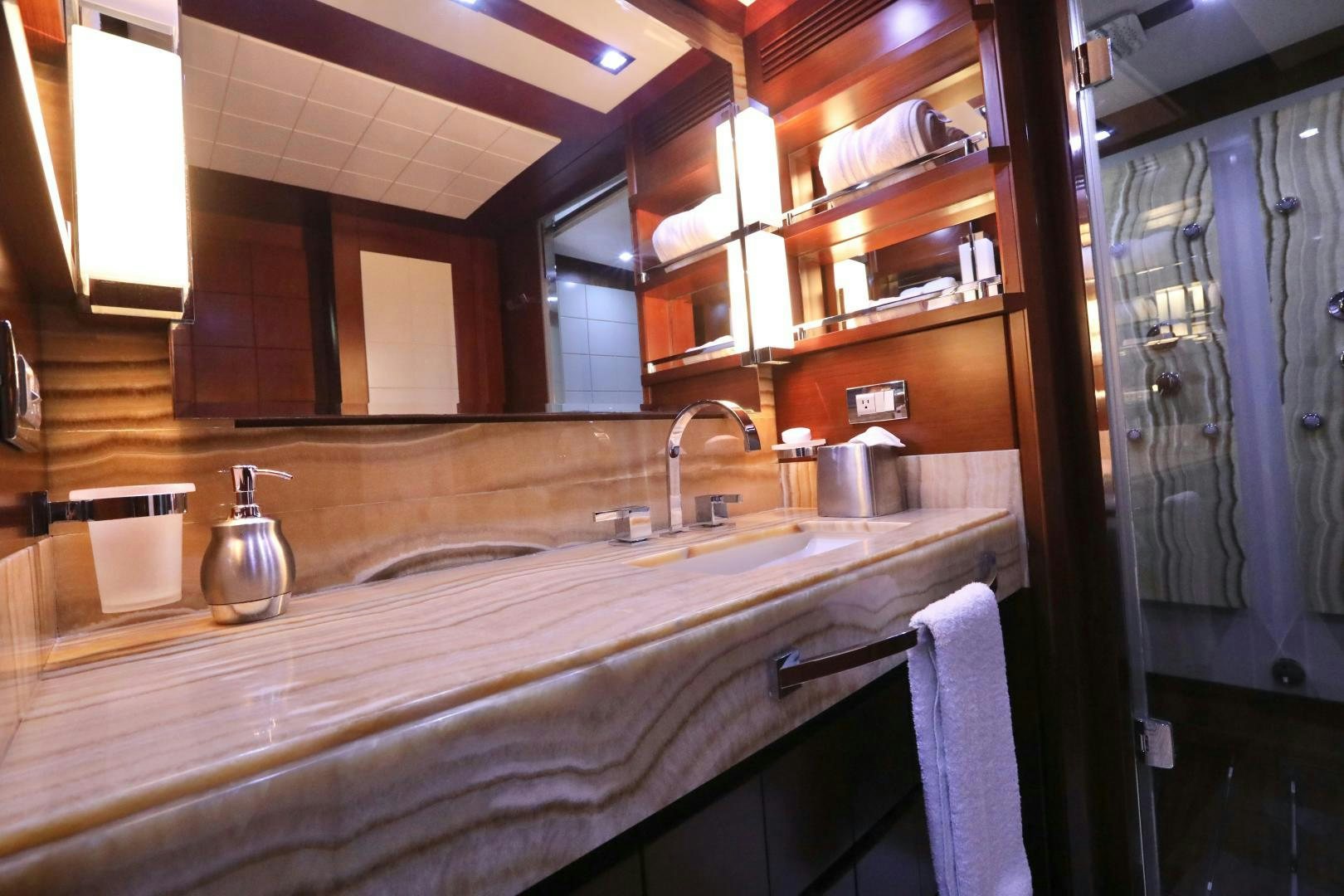 a bathroom with a sink and a mirror aboard ANDREIKA Yacht for Sale