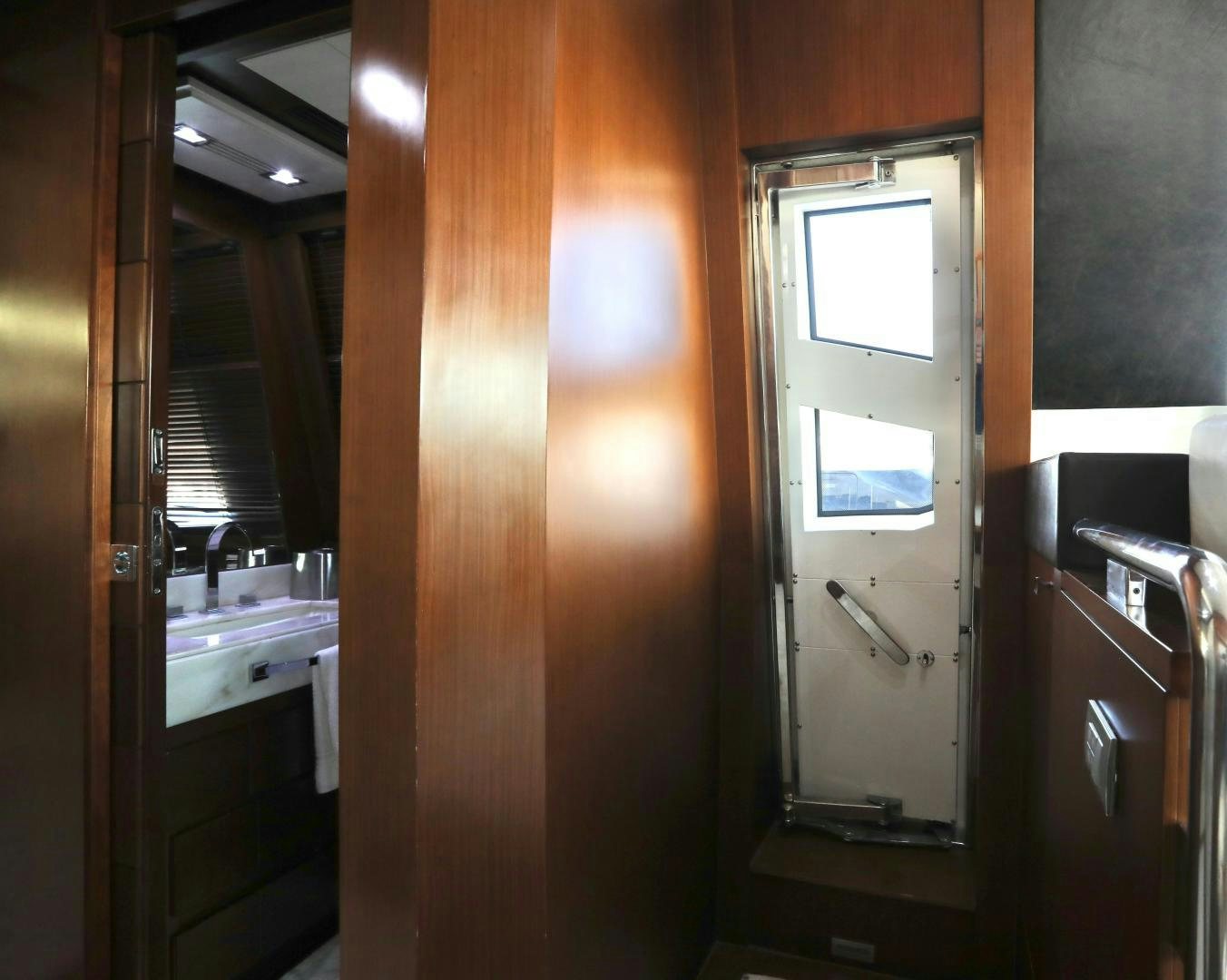 a room with a door and a mirror aboard ANDREIKA Yacht for Sale