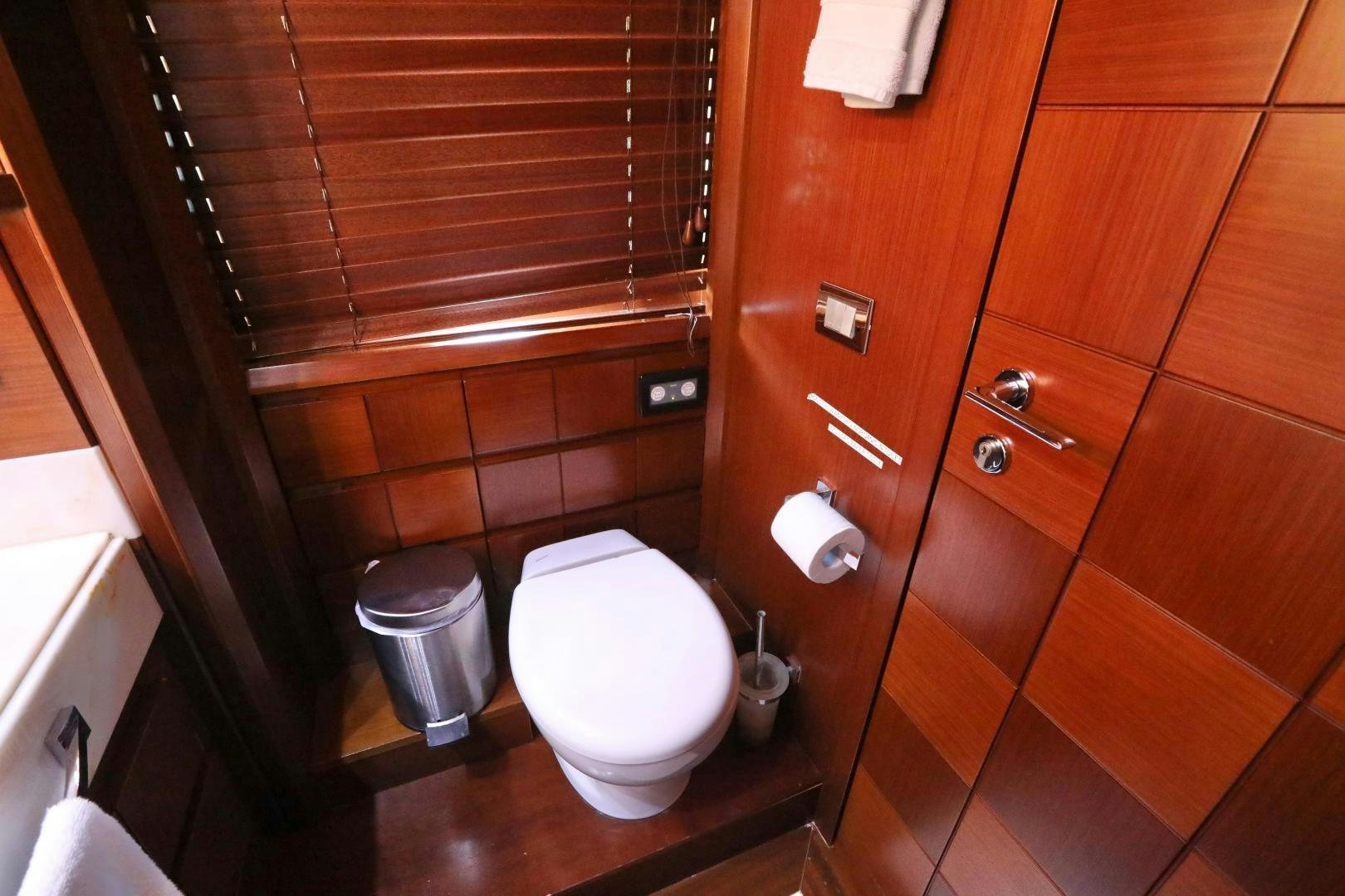 a toilet in a bathroom aboard ANDREIKA Yacht for Sale