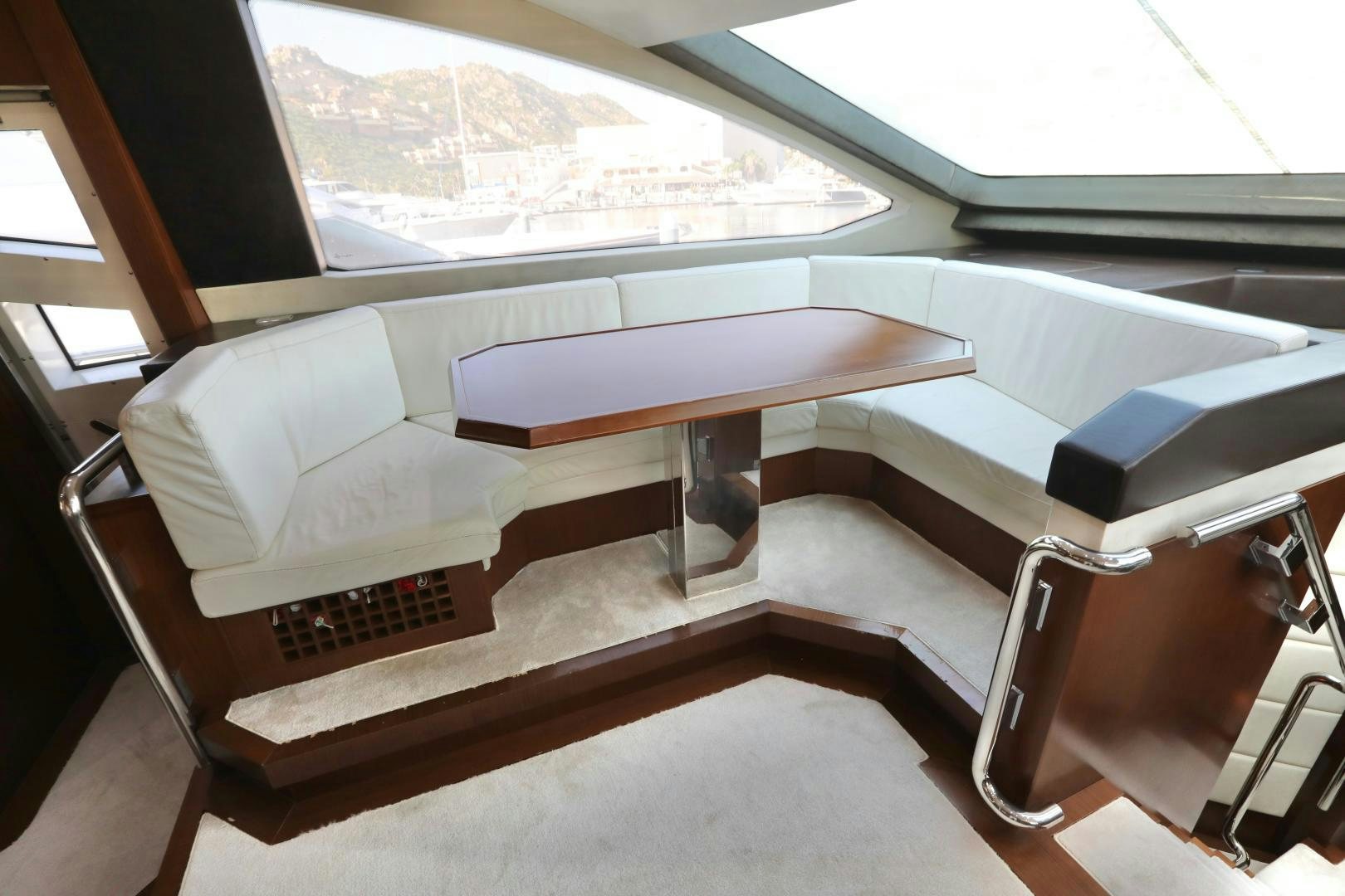 a room with a bench and a table aboard ANDREIKA Yacht for Sale