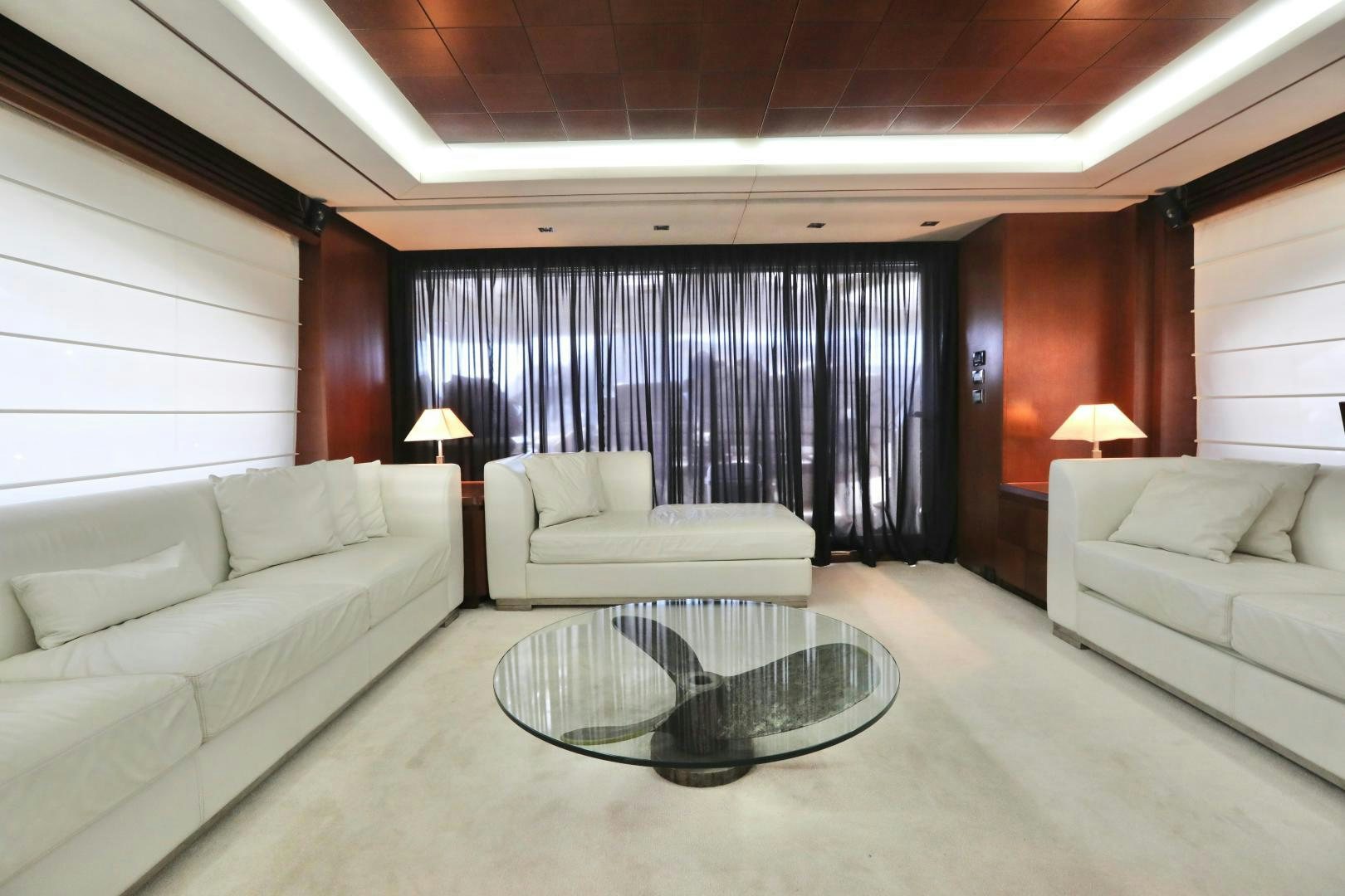 a living room with a large window aboard ANDREIKA Yacht for Sale