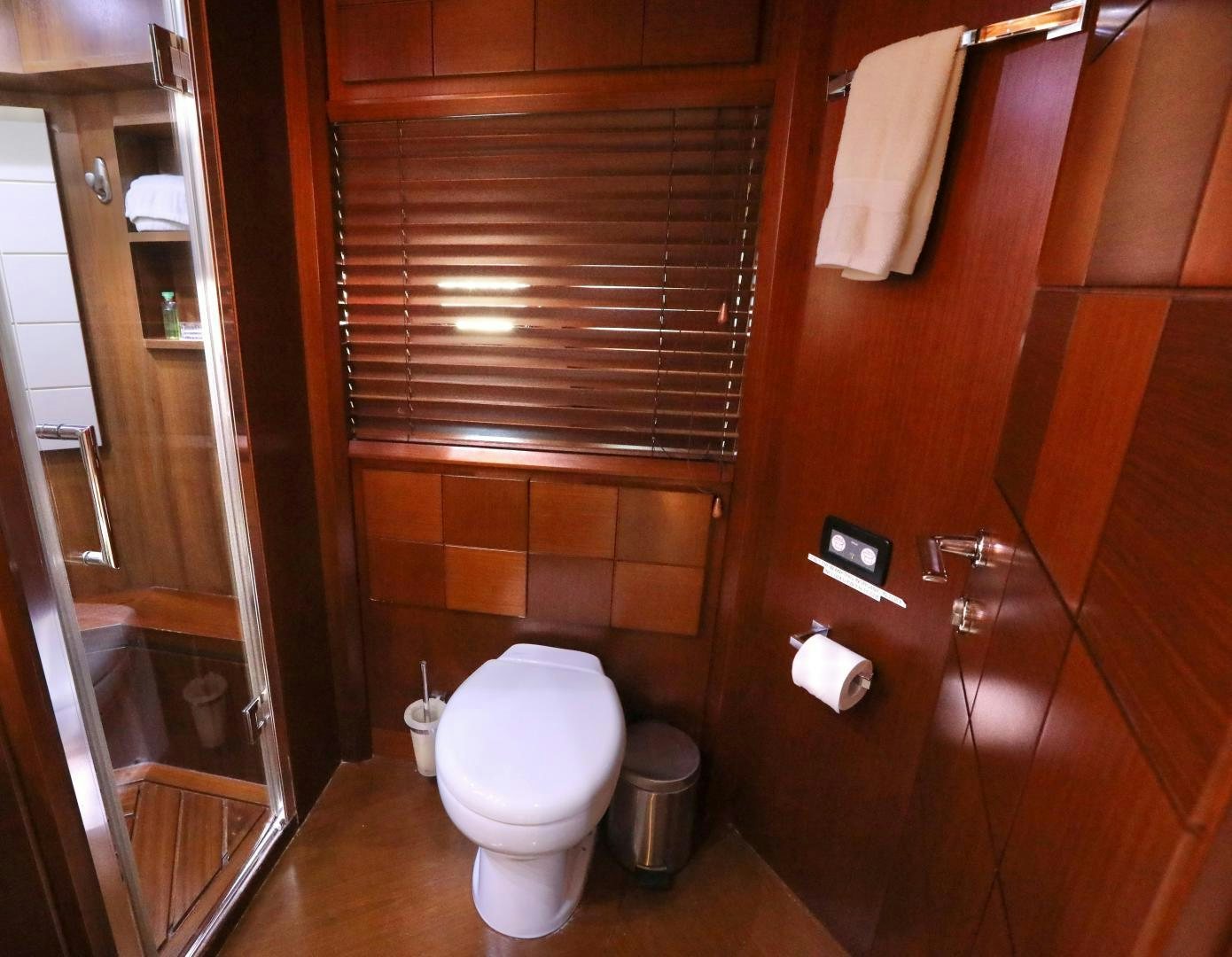 a bathroom with a toilet and a shower aboard ANDREIKA Yacht for Sale