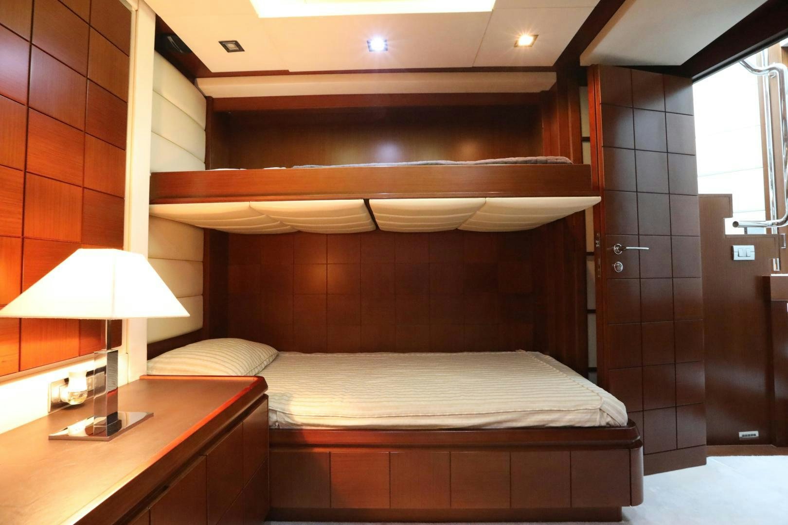 a bed in a room aboard ANDREIKA Yacht for Sale