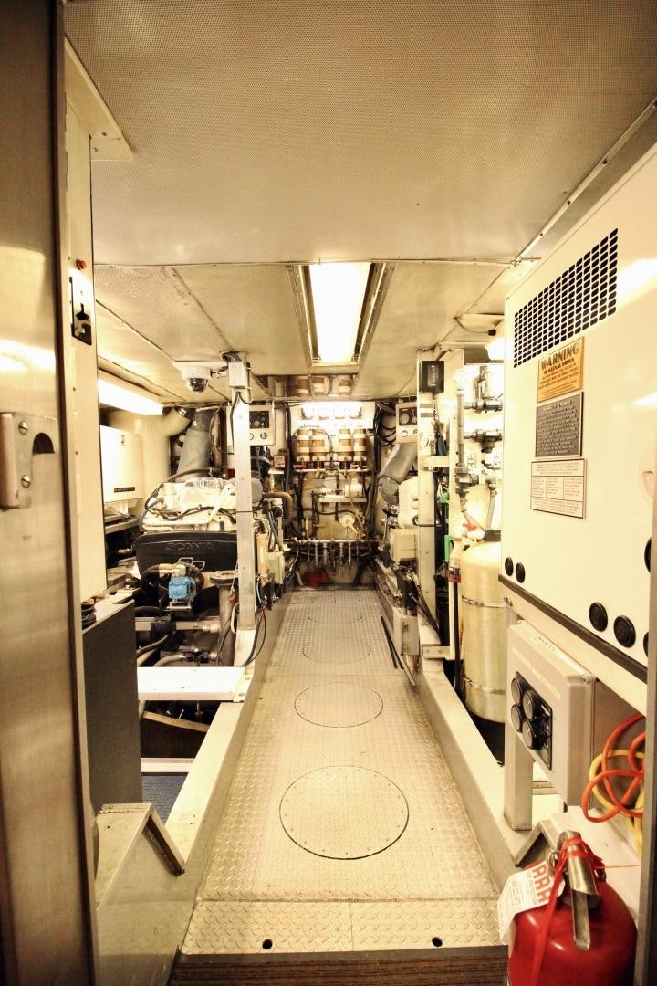 a hallway with a few beds aboard REFLECTIONS Yacht for Sale