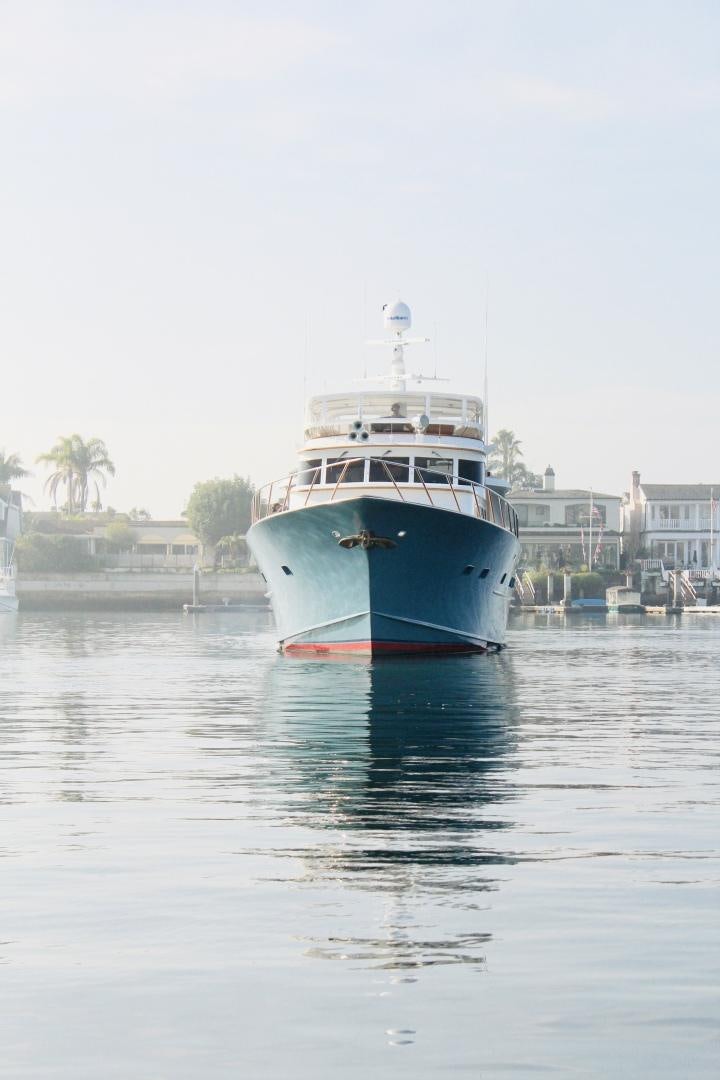 a large boat in the water aboard REFLECTIONS Yacht for Sale