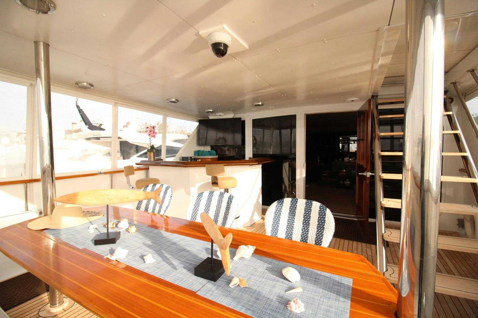 a room with a staircase and a staircase aboard REFLECTIONS Yacht for Sale