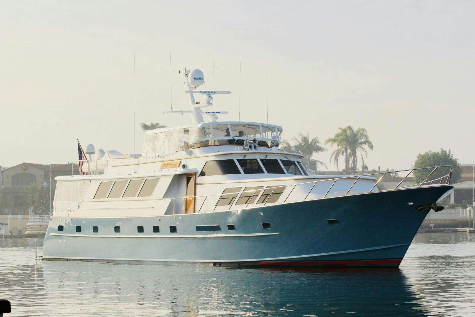 a large boat in the water aboard REFLECTIONS Yacht for Sale