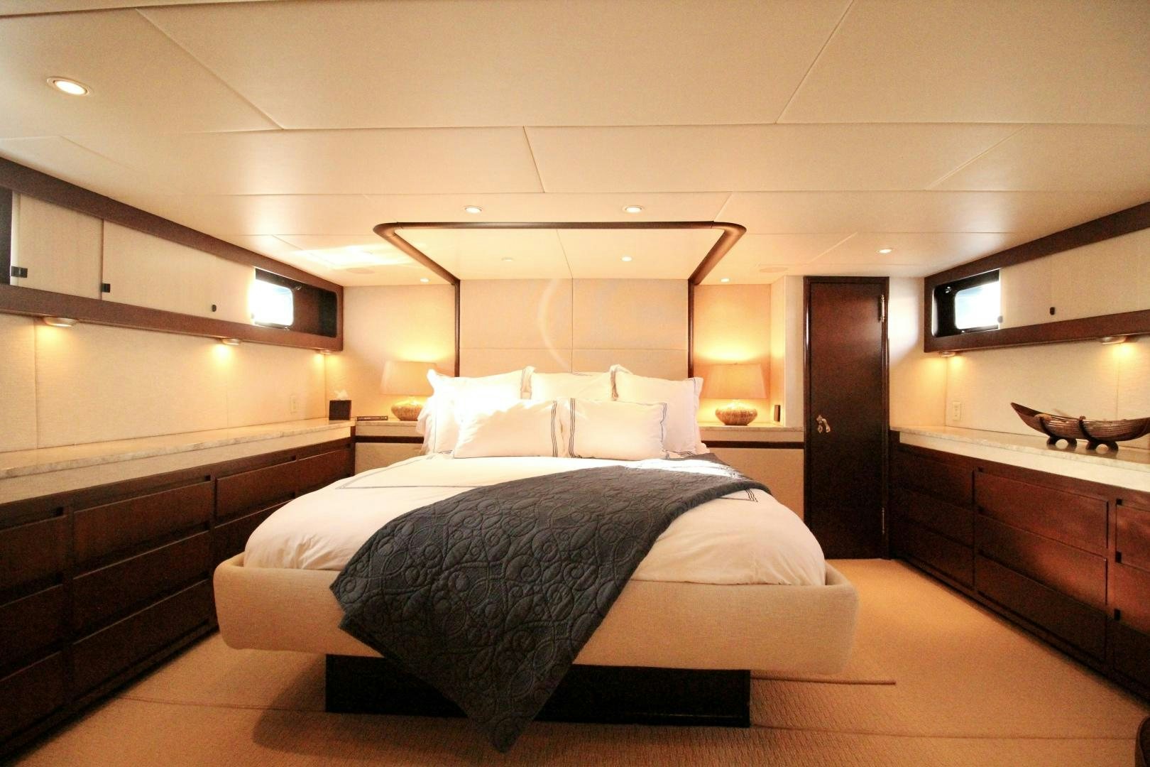 a large bedroom with a bed aboard REFLECTIONS Yacht for Sale