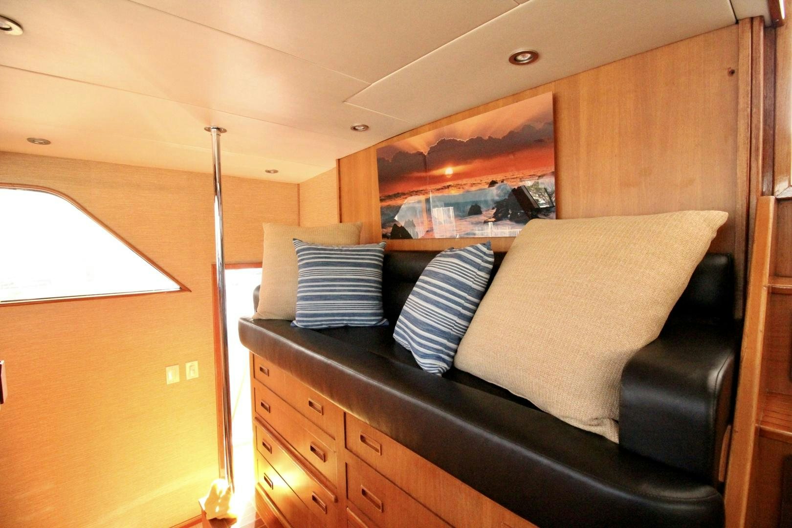 a couch in a room aboard REFLECTIONS Yacht for Sale