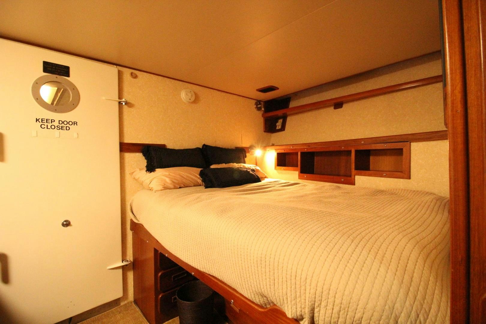 a couple of beds in a room aboard REFLECTIONS Yacht for Sale